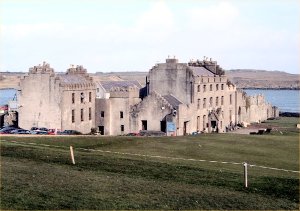 Ardglass Castle: A range of fortified warehouses at the harbour entrance, dating from the 12th century and known as the Newark (the New Works) was acquired by Lord Charles Fitzgerald in 1790. He converted the central section into Ardglass Castle, which he sold to William Ogilvie in 1806. The property subsequently passed to his-son-in law Charles Beauclerc, who went bankrupt in 1896. The castle and grounds were bought by a group of local men wishing to start a golf club Photo - Pat Devlin CLICK FOR LARGER PICTURE